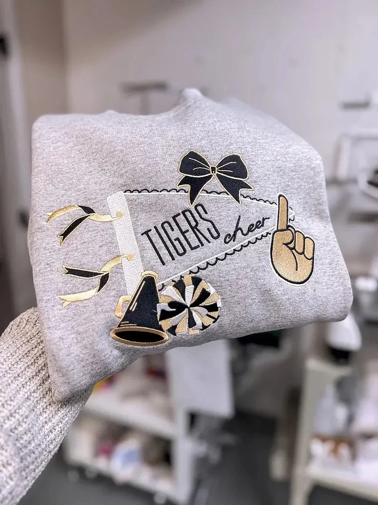 Custom Embroidered Cheer Team Sweatshirt with your team name mascot and even individual names