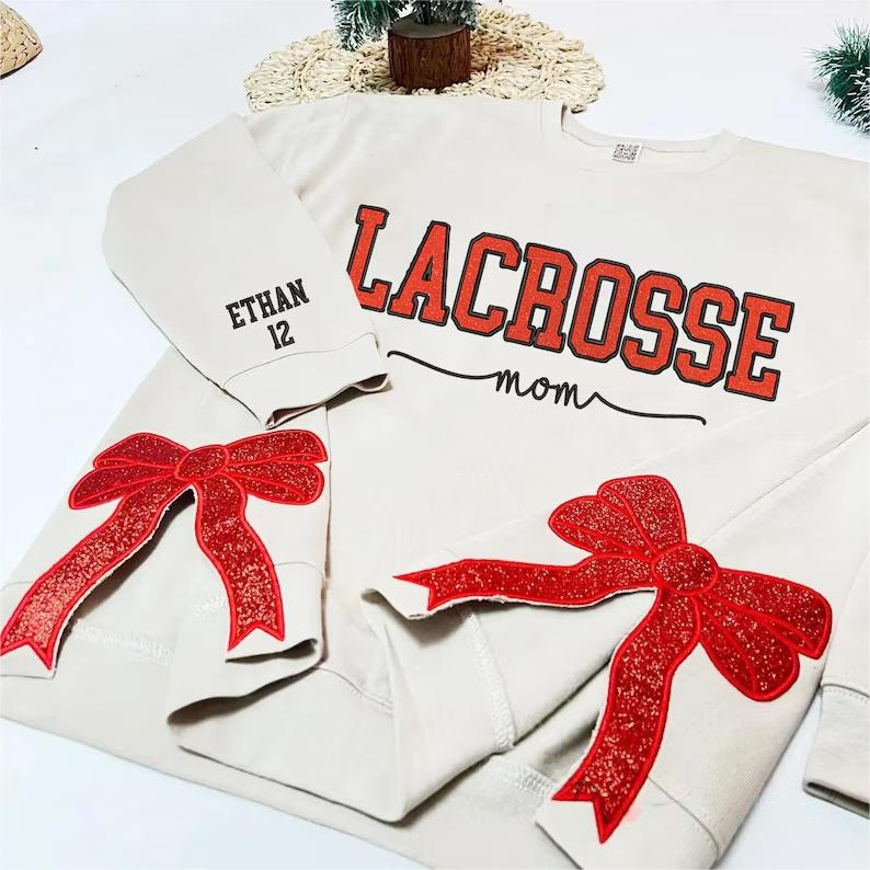 Personalized Glitter Lacrosse Mom Embroidered Side Bow Cut-Out Sweatshirt With Name On Sleeve